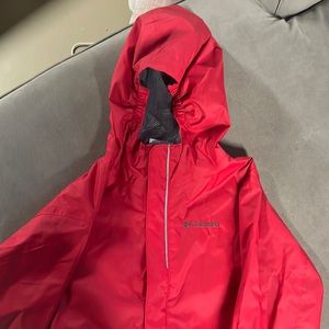 Children’s large Columbia rain jacket with hood.